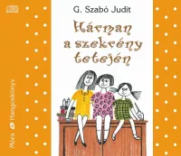 Hárman a szekrény tetején